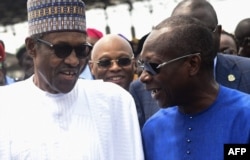 Le président nigérian Muhammadu Buhari et son homologue béninois Patrice Talon le 23 octobre 2018.