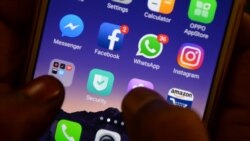 FILES - This photo taken on March 22, 2018 shows apps for WhatsApp, Facebook, Instagram and other social networks on a smartphone in Chennai.