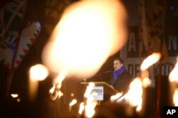 Chairman of opposition Jobbik party of Hungary Gabor Vona delivers his speech during the party's anti-government protest held at the headquarters of Fidesz, the Hungarian Civic Party in Budapest, Hungary, Dec. 15, 2017.