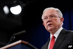 FILE - Then-Attorney General Jeff Sessions speaks during a news conference at the Department of Justice in Washington, Nov. 1, 2018.