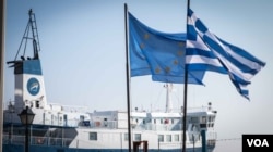 At the water’s edge on Chios port. Fractured relations from EU down to the Greek government and the local authorities on Chios have exacerbated the issues. (J. Owens for VOA)