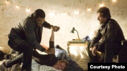 TYLER PERRY (left) and EDWARD BURNS (right) star in ALEX CROSS