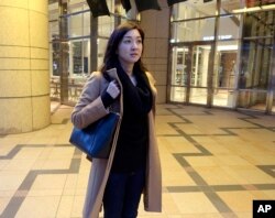 In this Dec. 25, 2017, photo, Mika Kobayashi speaks during an interview in Tokyo.