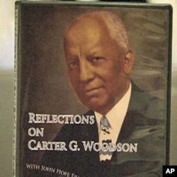 FILE - A poster of Dr. Carter G. Woodson, a founder of the Association for the Study of African American History