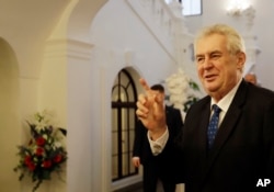 FILE - Czech President Milos Zeman arrives for a parliamentary session in Prague, Czech Republic, Feb. 21, 2017.