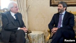 Italian President Sergio Mattarella meets new elected Chamber of Deputies president Roberto Fico at the Quirinale Palace in Rome, March 24, 2018.