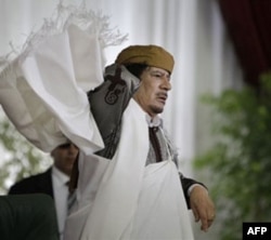 Liviya sharqida Qaddafiy kuchlari, muxolifat olishmoqda