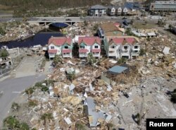 An aerial photo shows damaged and destroyed homes after Hurricane Michael smashed into Florida's northwest coast in Mexico Beach, Oct. 12, 2018.