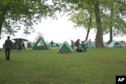 The group spent the nights camped out by the river.