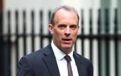 Britain's Foreign Secretary Dominic Raab arrives at Downing Street ahead of a cabinet meeting in London, Britain, July 14, 2020. REUTERS/Hannah McKay