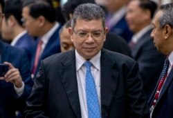 រូបឯកសារ៖ រដ្ឋមន្ត្រី​ការបរទេស​ម៉ាឡេស៊ីលោក Saifuddin Abdullah នៅ​ពេល​លោក​ទៅ​ចូលរួម​កិច្ចប្រជុំ​ពិសេស​នៃ​រដ្ឋមន្ត្រី​ការបរទេស​នៃ​ក្រុមប្រឹក្សា​សម្របសម្រួល​សមាគម​ប្រជាជាតិ​អាស៊ីអាគ្នេយ៍ (អាស៊ាន) នៅ​ទីក្រុងវៀងច័ន្ទ ប្រទេសឡាវ កាលពី​ថ្ងៃទី២០ ខែកុម្ភៈ ឆ្នាំ២០២០។