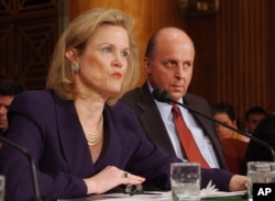 FILE - In this April 7, 2004 file photo, Robin Raphel, coordinator of the State Department's Office of Iraq Reconstruction, discusses the U. N.'s Oil for Food Program on Capitol Hill during an appearance before Senate Foreign Relations Committee.