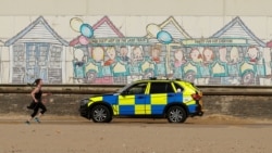 Police are seen on Bournemouth beach, as the spread of the coronavirus disease (COVID-19) continues, Bournemouth, Britain, April 5, 2020.
