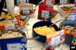 Extra toppings for cereal are available at Kellogg's NYC Cafe in New York, Dec. 14, 2017.
