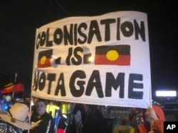 A small group of indigenous protesters blocked a Gold Coast road, bringing a temporary halt to the Queen's baton relay before the opening ceremony for the 2018 Commonwealth Games at Carrara Stadium on the Gold Coast, Australia, April 4, 2018.