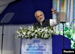 India's Prime Minister Narendra Modi delivers a speech after he inaugurated the country's first international exchange in Gandhinagar, India, Jan. 9, 2017.