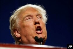 Republican presidential candidate Donald Trump speaks to supporters during a rally in Fort Worth, Texas, Feb. 26, 2016.