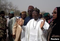 Information Minister Lai Mohammed speaks during his visit to the school in Dapchi in the northeastern state of Yobe, where dozens of school girls went missing after an attack on the village by Boko Haram, Nigeria, Feb. 22, 2018.