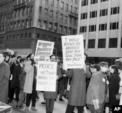 Anti-Vietnam war protesters march up Fifth Avenue in New York City on April 10, 1966.