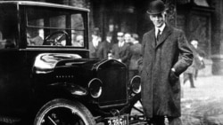 Henry Ford with a Model T.
