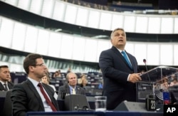 Hungary's Prime Minister Viktor Orban addresses the European Parliament in Strasbourg, France, Sept.11, 2018, a day before the vote.