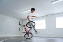 Takahiro Ikeda, 31, breaks the new Guinness World Record for "Most BMX Stick B in 30 seconds" in Chiba, Japan October 20, 2021. (Courtesy of Guinness World Records 2021/Masakazu Senda/Handout via REUTERS)
