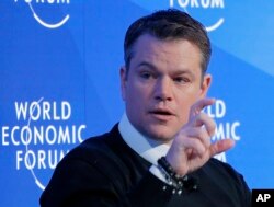 FILE - U.S. actor Matt Damon gestures as he speaks at the World Economic Forum in Davos, Switzerland, Jan. 17, 2017.