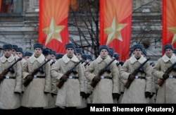 RUSSIA -- Russian servicemen dressed in historical uniforms wait before a military parade at Red Square in Moscow, Russia November 7, 2017.