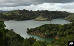 Briones Reservoir is seen near capacity in Orinda, California, Jan. 11, 2017. A stunning transformation was caused by an unrelenting series of storms in the North that filled lakes, overflowed rivers and buried mountains in snow.