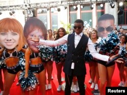 FILE - OMI performs.