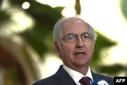 FILE - Venezuelan opposition leader and former Caracas Mayor Antonio Ledezma addresses the press in Washington, Nov. 28, 2017.