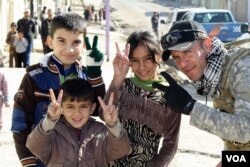 Despite the destruction, Mosul residents say they are thrilled Iraqi forces have retaken their neighborhoods in Mosul, Iraq, Nov. 27, 2016. (H. Murdock/VOA)