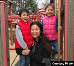 An earlier picture of Khemarey Khoeun with her two children. (Courtesy of Khoeun)