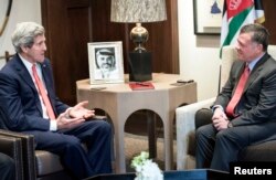 FILE - U.S. Secretary of State John Kerry, left, meets with Jordan's King Abdullah at Al-Hummar Palace in Amman Jan. 5, 2014.