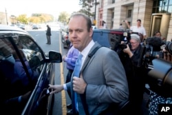 Rick Gates gets into a car as he leave Federal District Court in Washington, Nov. 2, 2017.