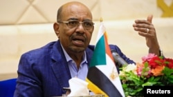 FILE - Sudan's President Omar Hassan al-Bashir speaks during a press conference at the palace in Khartoum, March 2, 2017.