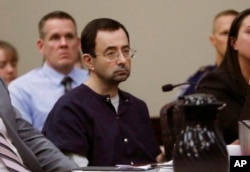 Larry Nassar sits during his sentencing hearing Wednesday, Jan. 24, 2018,