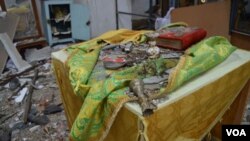 რუსული ჭურვით დაგრეული უკრაინული ეკლესია, ლუღანსკის ოლქი