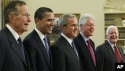 Members of the exclusive Presidents Club (from left) George H.W. Bush, Barack Obama, George W. Bush, Bill Clinton and Jimmy Carter, Wednesday, Jan. 7, 2009, in the Oval Office