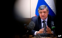 FILE - Russian President Vladimir Putin's special envoy for Afghanistan Zamir Kabulov speaks during a press conference in Brussels, Belgium, Oct. 26, 2017.