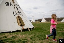 A group protesting the Dakota Access oil pipeline has set up teepees on the National Mall near the Washington Monument in Washington, March 7, 2017.