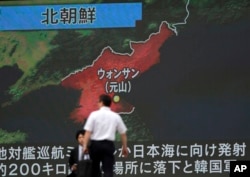 A screen shows a news program reporting about North Korea's missile firing from Wonsan, June 8, 2017, in Tokyo. North Korea fired several suspected short-range anti-ship missiles off its east coast Thursday, South Korea's military said.