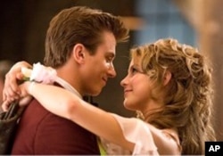 Julianne Hough, right, and Kenny Wormald in a scene from "Footloose"