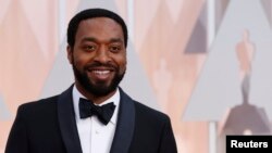 FILE - Actor Chiwetel Ejiofor, shown at the 87th Academy Awards in Hollywood, California, Feb. 22, 2015, was among the big names in the newly released video "What They Took With Them."