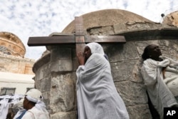 Ethiopian Christian pilgrims attend Good Friday procession in Jerusalem, April 14, 2017.