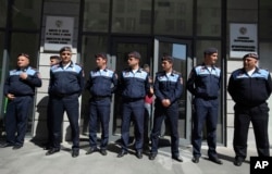 Police block the entrance to the Ministry of Justice in Yerevan, Armenia, May 2, 2018.