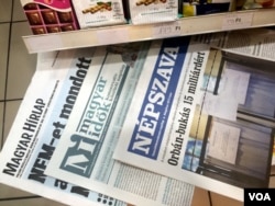 Newspaper headlines in Budapest declare the referendum against EU-mandated refugee quotas a failure due to low turnout, saying “The Country Said No” and “The Referendum Failed,” despite government declarations of an overwhelming victory, Oct. 3 2016. (VOA