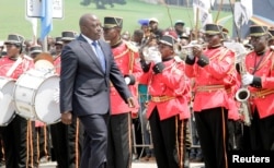 Democratic Republic of the Congo President Joseph Kabila inspects a guard of honor during the anniversary celebrations of the DRC's independence from Belgium in Kindu, DRC, June 30, 2016.