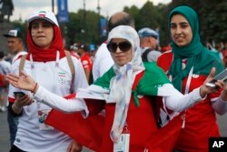 Iranian fans dance in front of Saint Petersburg stadium prior the group B match between Morocco and Iran at the 2018 soccer World Cup in St. Petersburg, Russia, June 15, 2018.