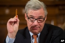 FILE - Senate Judiciary Committee member Sen. Sheldon Whitehouse makes a statement on Capitol Hill in Washington, Jan. 11, 2017. It was the second day of a confirmation hearing for Attorney General-designate Sen. Jeff Sessions, R-Ala.